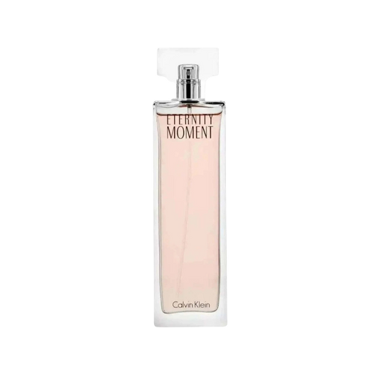 Calvin Klein Eternity Moment Eau de Toilette perfume bottle with a rectangular glass body, light pink liquid, and a clear cap, shown on a plain white background.