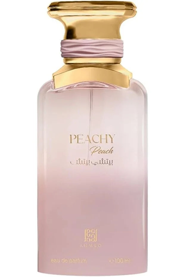 Pink perfume bottle with gold cap on a white background