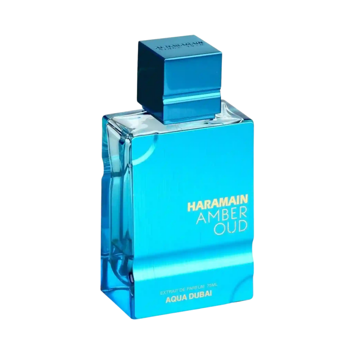 A rectangular glass perfume bottle with a metallic blue cap, labeled 'HARAMAIN AMBER OUD' and 'AQUA DUBAI', on a plain white background.