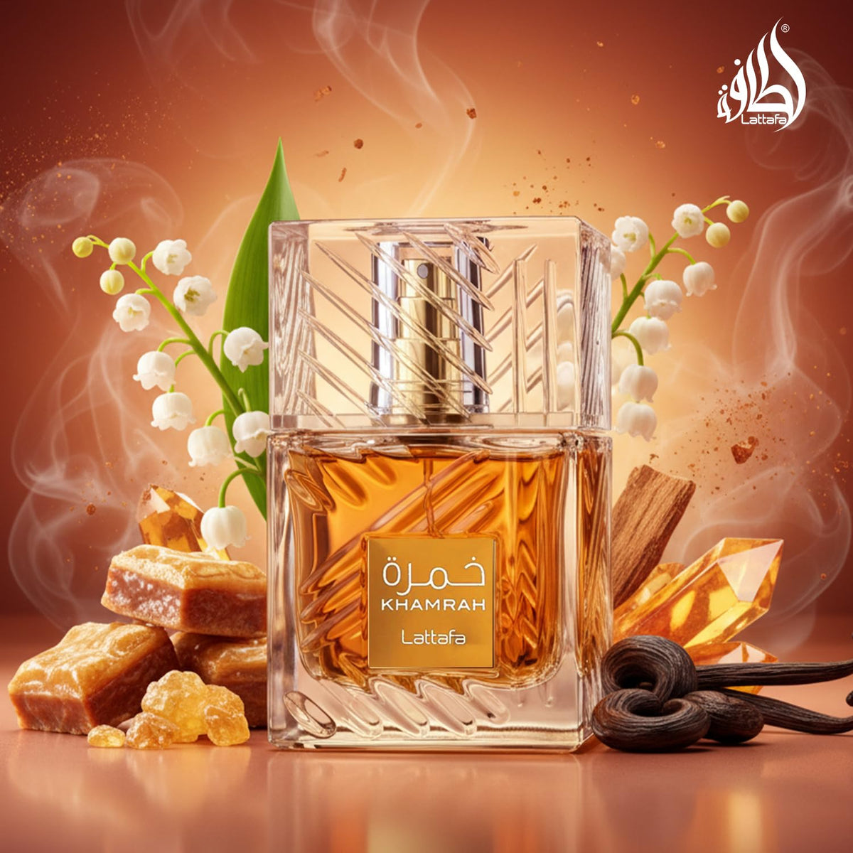 Khamrah perfume bottle by Lattafa with vanilla beans and flowers on a warm background