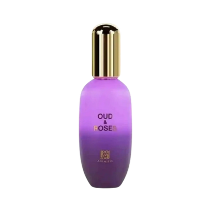A purple gradient cosmetic bottle with a shiny gold cap, labeled 'OUD & ROSE' and 'Ahmed Al Maghiribi', on a plain white background.