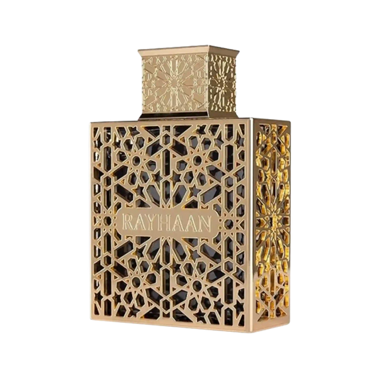 A luxury perfume bottle with intricate geometric gold cutout patterns, featuring a gold cap and a central gold label that reads 'RAYHAAN'.