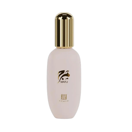 A pale pink cosmetic bottle with a shiny gold cap, featuring the brand name MARJ and 'porcelain amber' printed on the front, set against a plain white background.
