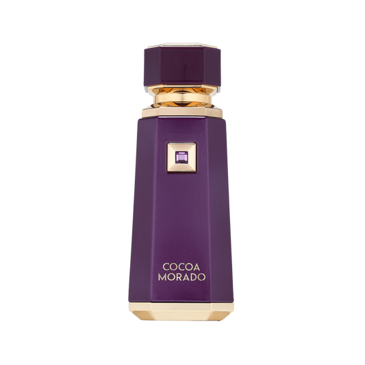 A faceted purple bottle of Cocoa Morado perfume with gold trim and a small purple crystal accent, centered on a plain white background.