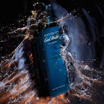 Davidoff Cool Water Intense perfume bottle with water splashes on a dark background