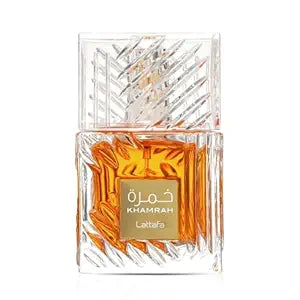 Perfume bottle with intricate design and 'Khamrah' branding on a white background