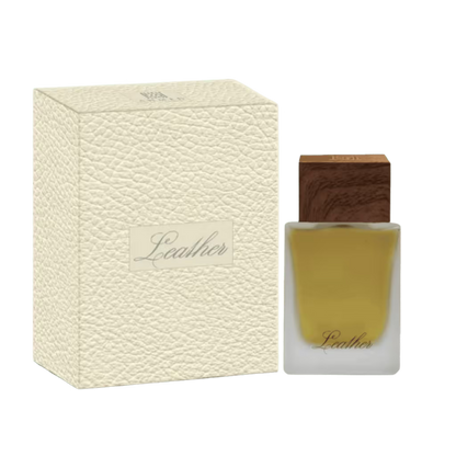 A perfume bottle labeled 'Leather' next to its textured cream-colored packaging box, on a plain white background.