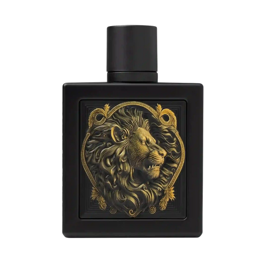 A matte black rectangular perfume bottle with a cylindrical cap, featuring a raised gold lion head emblem inside an ornate heart-shaped border on the front.